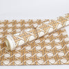 Grand Caning Grasscloth Wallpaper in Loafer and coordinating fabric